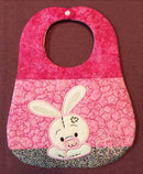 Bunny Bib 6x10 7x12 - Sweet Pea Australia In the hoop machine embroidery designs. in the hoop project, in the hoop embroidery designs, craft in the hoop project, diy in the hoop project, diy craft in the hoop project, in the hoop embroidery patterns, design in the hoop patterns, embroidery designs for in the hoop embroidery projects, best in the hoop machine embroidery designs perfect for all hoops and embroidery machines