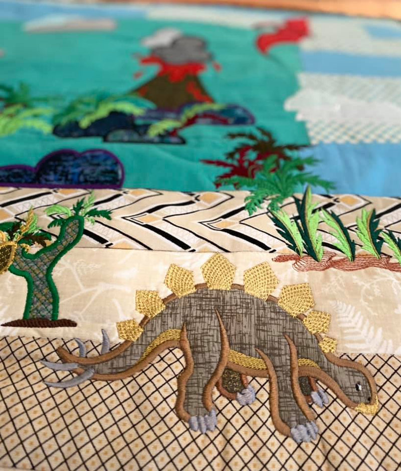 Dinosaur in the Cretaceous (Floating) Quilt 5x7 - Sweet Pea Australia In the hoop machine embroidery designs. in the hoop project, in the hoop embroidery designs, craft in the hoop project, diy in the hoop project, diy craft in the hoop project, in the hoop embroidery patterns, design in the hoop patterns, embroidery designs for in the hoop embroidery projects, best in the hoop machine embroidery designs perfect for all hoops and embroidery machines