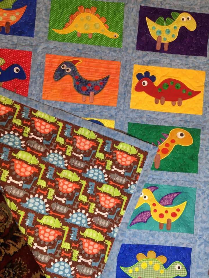 Dinosaur quilt 5x7 6x10 8x12 - Sweet Pea Australia In the hoop machine embroidery designs. in the hoop project, in the hoop embroidery designs, craft in the hoop project, diy in the hoop project, diy craft in the hoop project, in the hoop embroidery patterns, design in the hoop patterns, embroidery designs for in the hoop embroidery projects, best in the hoop machine embroidery designs perfect for all hoops and embroidery machines